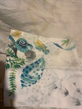 Handcrafted Cotton Napkin with Teal Seaweed Motif and shells . Set of 4